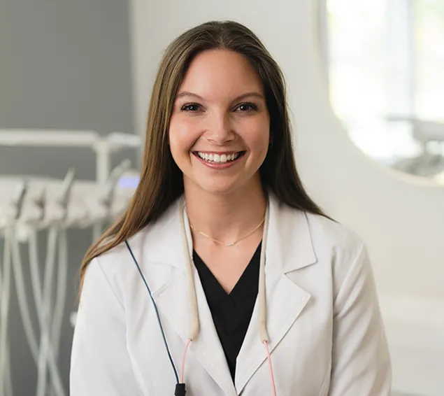 Dr. Brittany Henry, D.D.S., AACD member, in a Pearly White Dentistry operatory.